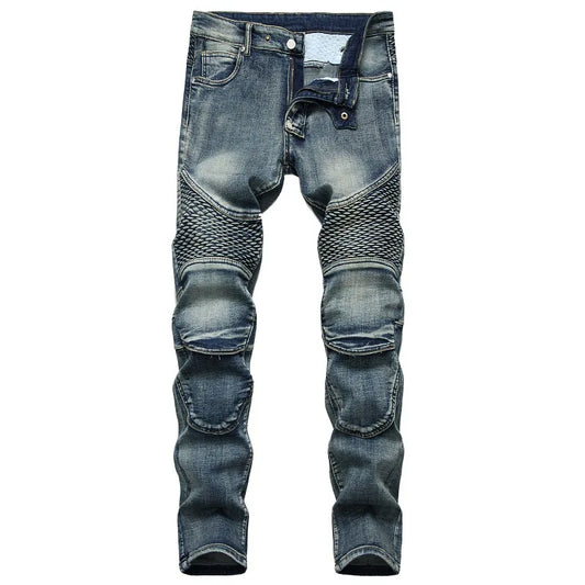 Blue denim jeans with knee patches on a white background