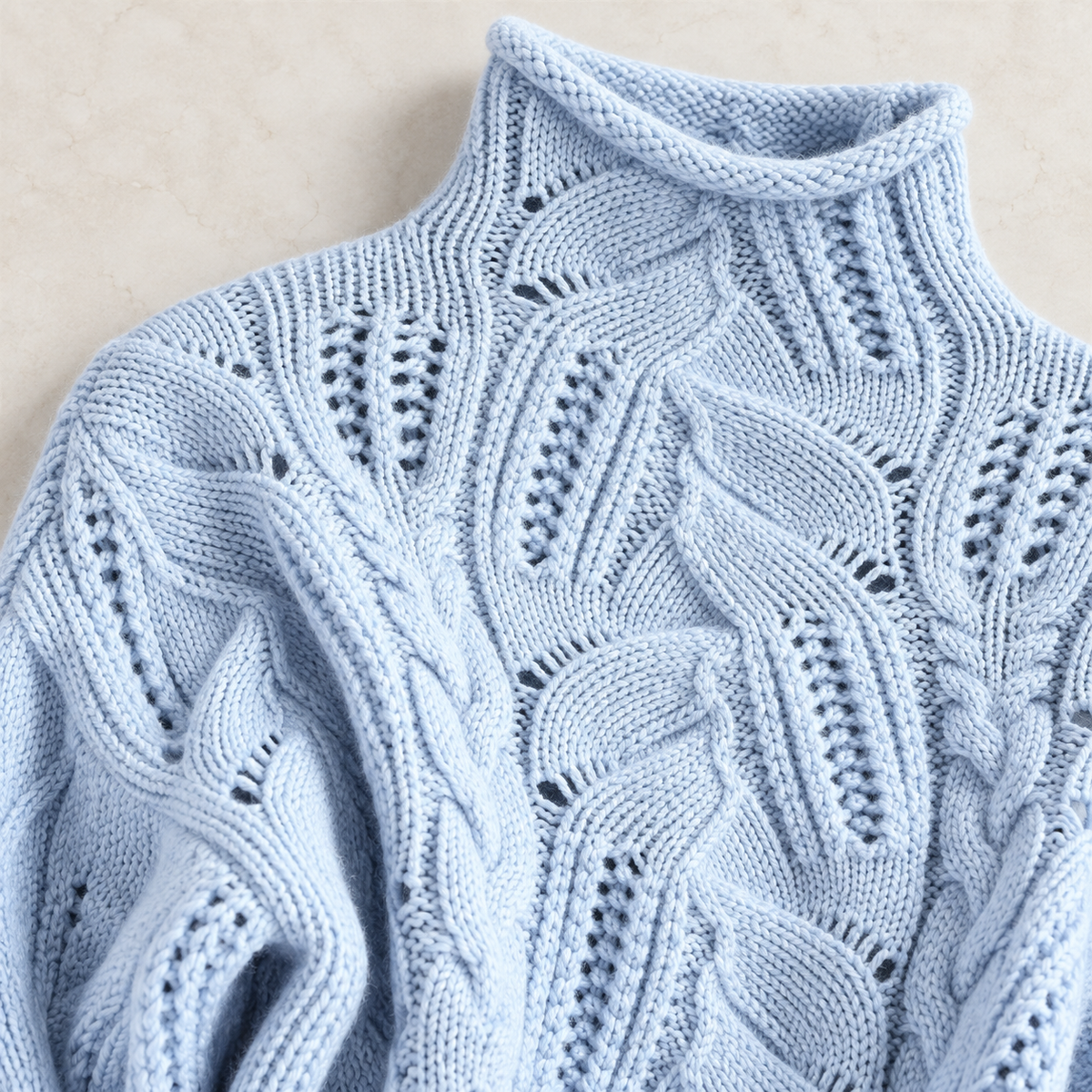 Nerina Cable-Knit Sweater in wavy blue, cable detail