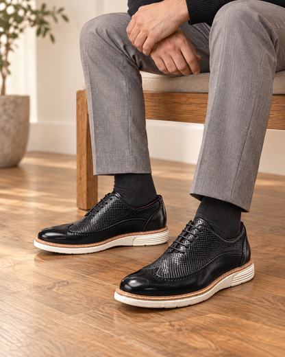 Carden Wingtip Lace-Ups in black, male wearing